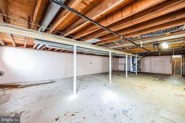 unfinished basement with heating unit