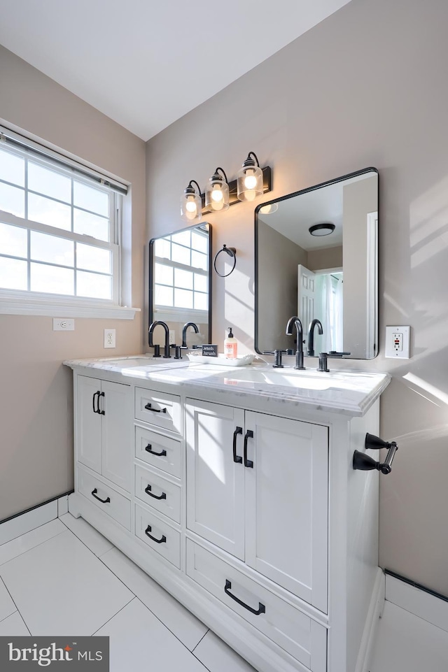 bathroom featuring vanity and tile patterned flooring