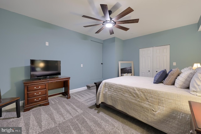 bedroom with carpet floors, ceiling fan, and a closet