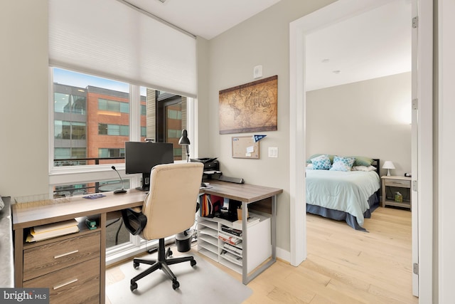 office space featuring light wood-type flooring