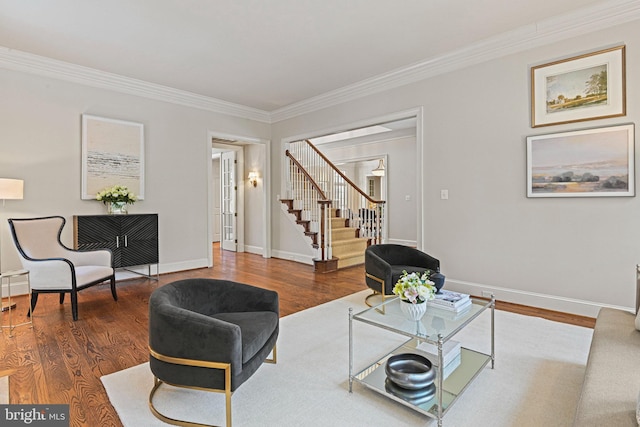 living room featuring dark hardwood / wood-style flooring and ornamental molding