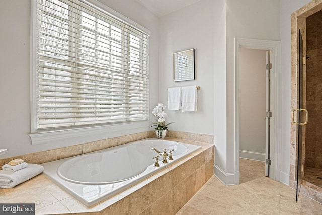 bathroom with independent shower and bath