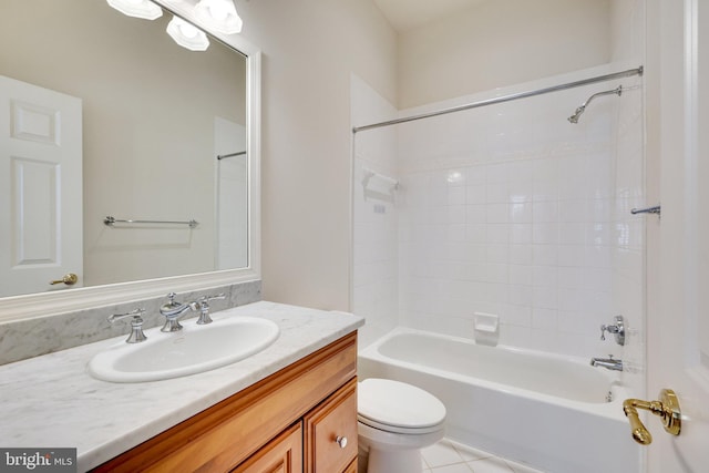 full bathroom featuring vanity, shower / washtub combination, tile patterned floors, and toilet