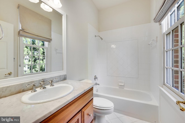 full bathroom featuring vanity,  shower combination, tile patterned floors, and toilet