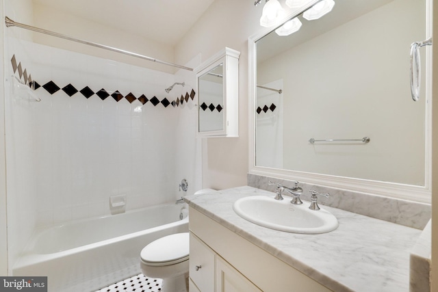 full bathroom with shower / tub combination, vanity, and toilet