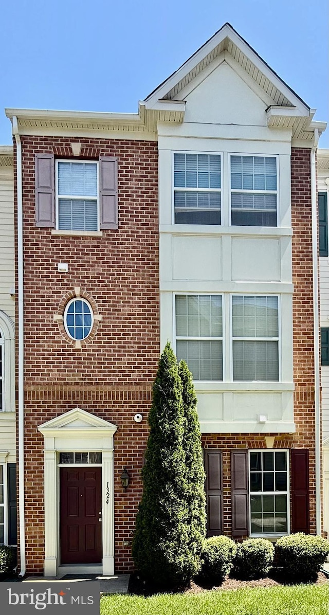 1324 Ray Ln, Glen Burnie, MD 21061 - townhome / multi-family property with brick siding