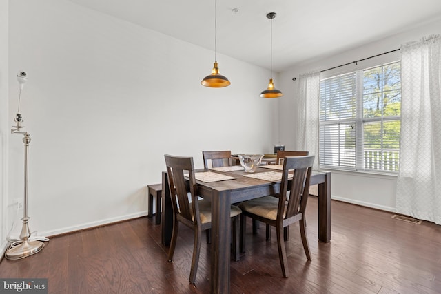 1324 Ray Ln, Glen Burnie, MD 21061 - dining room with baseboards, visible vents, wood finished floors, and a wealth of natural light