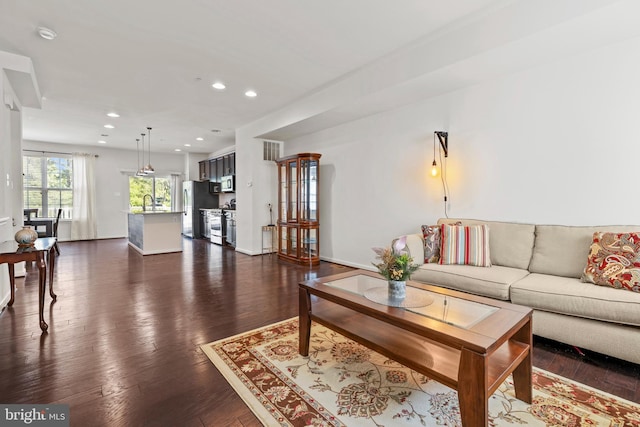 1324 Ray Ln, Glen Burnie, MD 21061 - living area featuring recessed lighting, baseboards, visible vents, and dark wood-style floors
