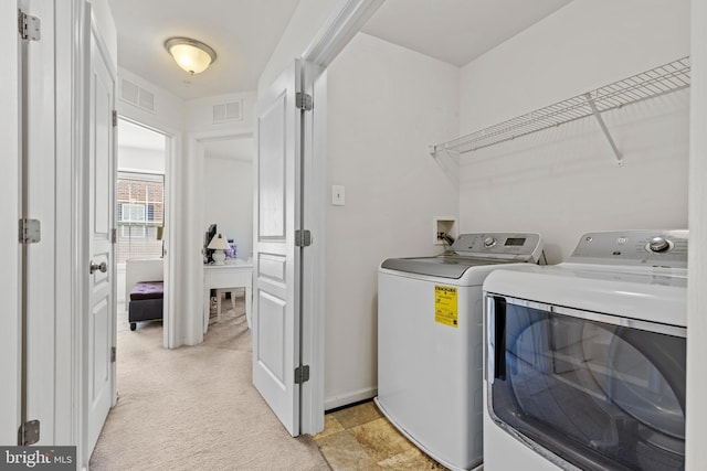 1324 Ray Ln, Glen Burnie, MD 21061 - laundry room with washer and dryer, laundry area, visible vents, and light carpet