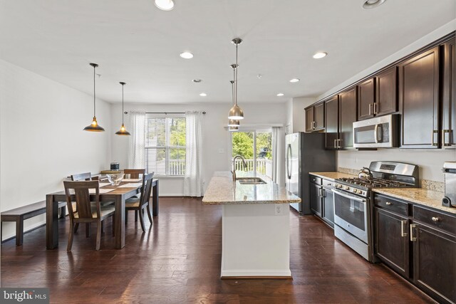 1324 Ray Ln, Glen Burnie, MD 21061 - kitchen with dark brown cabinets, light stone counters, a sink, stainless steel appliances, and recessed lighting