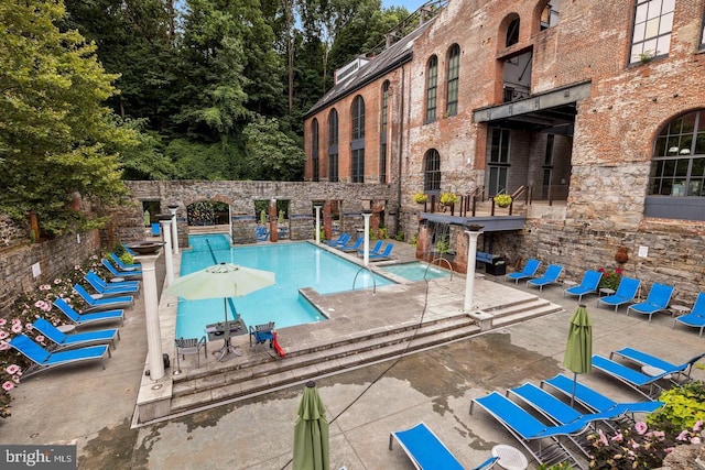 view of pool with a patio