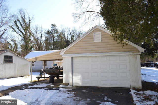 view of snow covered garage