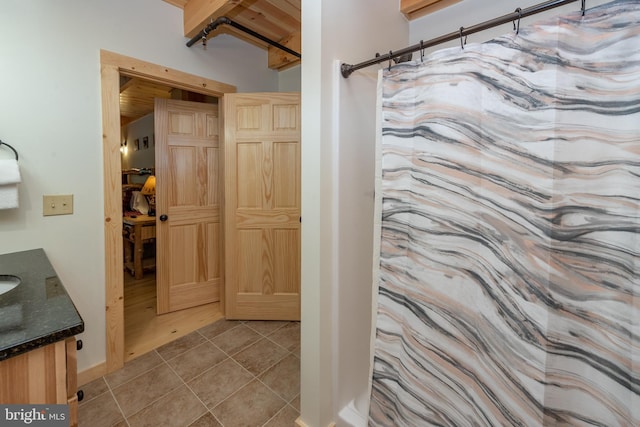 35 Blue Mountain Vw, Mc Henry, MD 21541 - bathroom with beam ceiling, tile patterned floors, vanity, and a shower with curtain