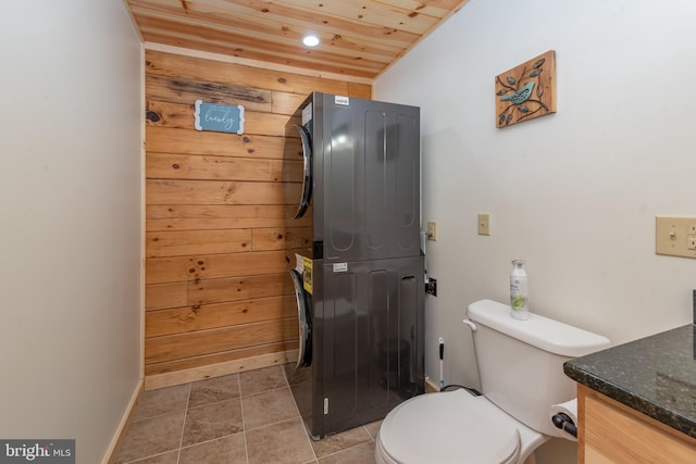 35 Blue Mountain Vw, Mc Henry, MD 21541 - bathroom featuring toilet, baseboards, stacked washer / dryer, wooden ceiling, and vanity