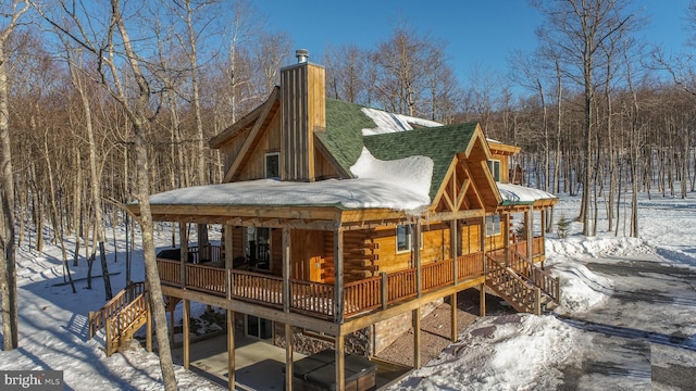 35 Blue Mountain Vw, Mc Henry, MD 21541 - snow covered rear of property featuring stairs, roof with shingles, a wooden deck, and a chimney