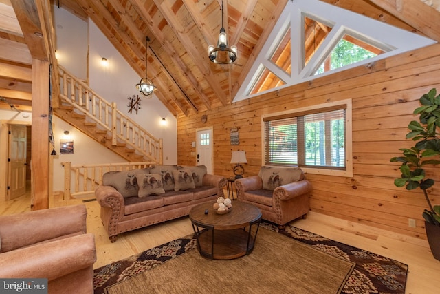 35 Blue Mountain Vw, Mc Henry, MD 21541 - living area featuring light wood finished floors, wood walls, high vaulted ceiling, and beamed ceiling