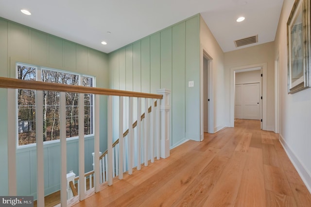 corridor featuring light hardwood / wood-style floors