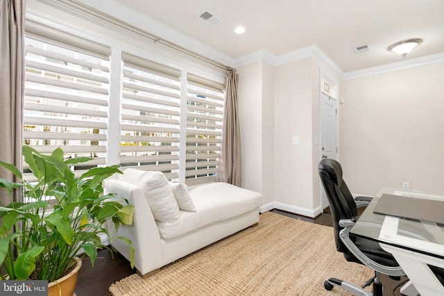 home office with hardwood / wood-style flooring and ornamental molding