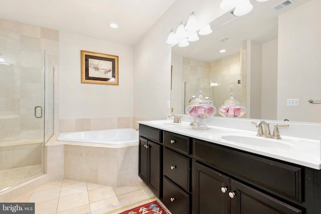 bathroom featuring independent shower and bath, vanity, and tile patterned floors