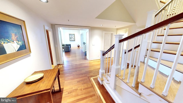 hallway featuring hardwood / wood-style flooring