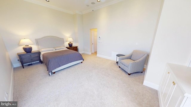 carpeted bedroom with crown molding