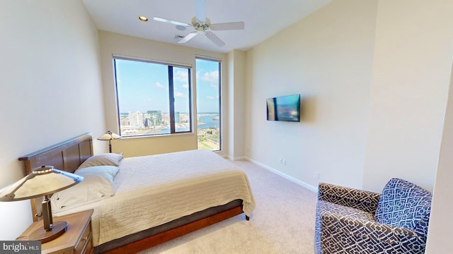 bedroom featuring ceiling fan and carpet flooring