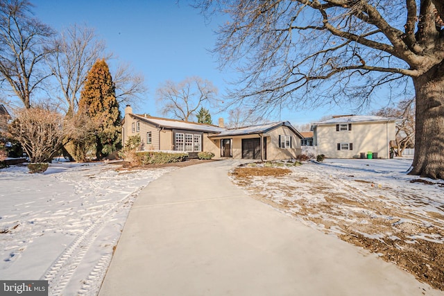 view of front of home with a garage