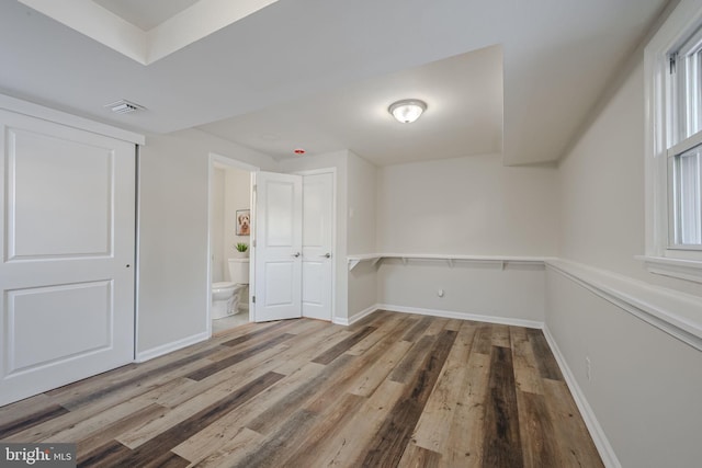 unfurnished room featuring wood-type flooring