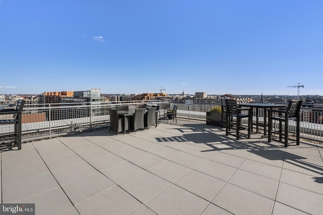 view of patio featuring a water view