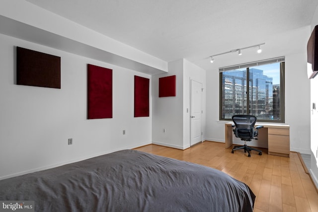 unfurnished bedroom with light hardwood / wood-style flooring