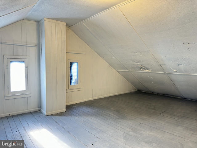 212 Logan St, Lewistown, PA 17044 - additional living space featuring lofted ceiling and hardwood / wood-style flooring