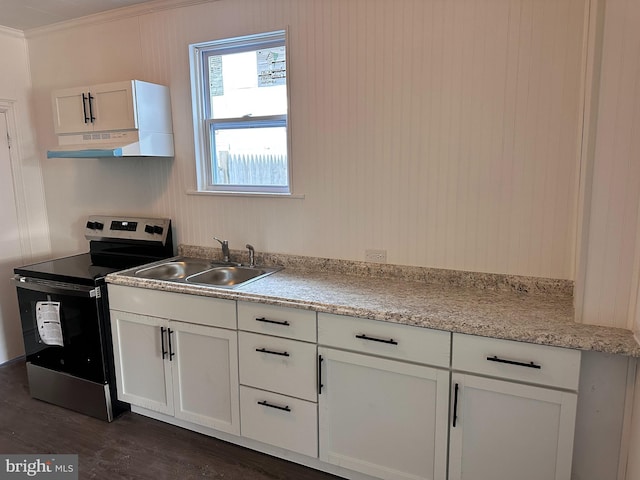 212 Logan St, Lewistown, PA 17044 - kitchen with dark hardwood / wood-style floors, white cabinetry, sink, ornamental molding, and electric stove