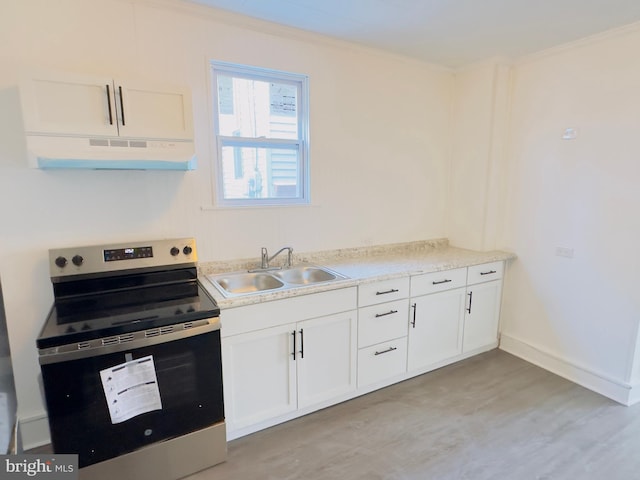 212 Logan St, Lewistown, PA 17044 - kitchen featuring sink, crown molding, white cabinets, and stainless steel electric range oven