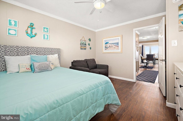 bedroom featuring crown molding, dark hardwood / wood-style floors, a textured ceiling, and ceiling fan