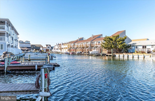 view of dock with a water view