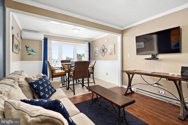 living room featuring ornamental molding, hardwood / wood-style floors, a wall unit AC, and a textured ceiling