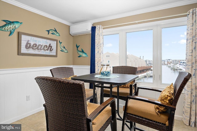 dining room with ornamental molding, a water view, light tile patterned floors, and a wall unit AC