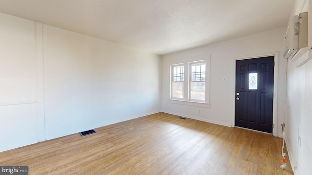 foyer with light hardwood / wood-style floors