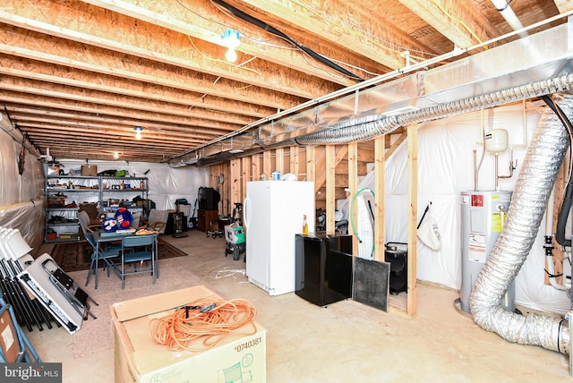 basement with white refrigerator and electric water heater