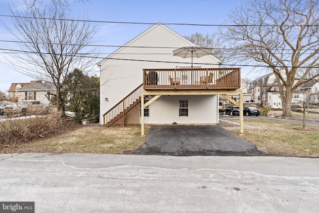 view of front of property featuring a deck