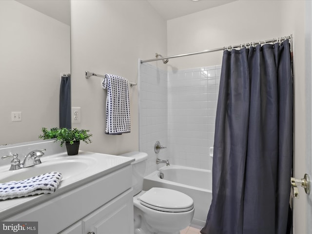 full bathroom featuring shower / bathtub combination with curtain, vanity, and toilet