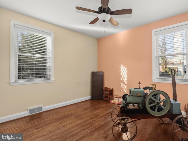 interior space with hardwood / wood-style flooring and ceiling fan