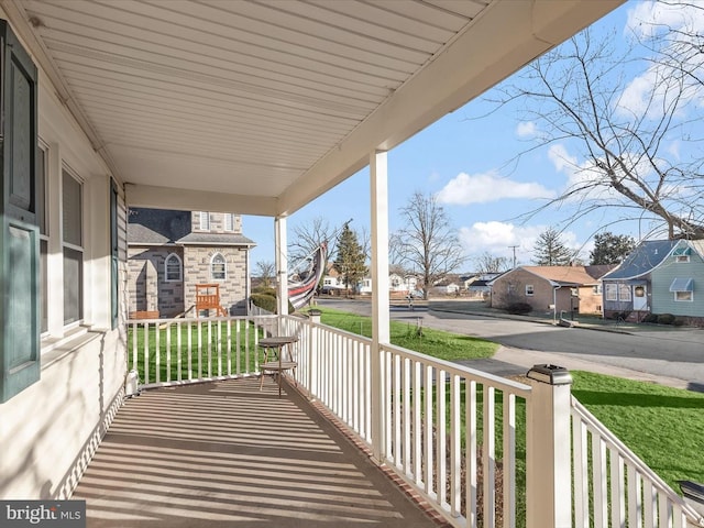 balcony featuring covered porch