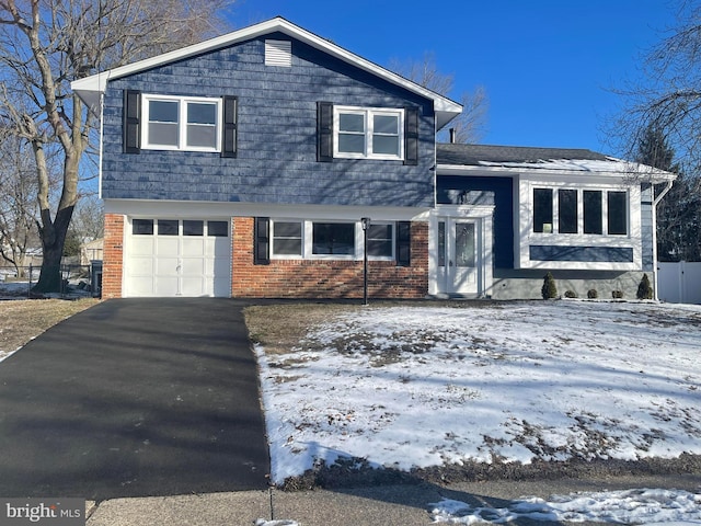 tri-level home featuring a garage