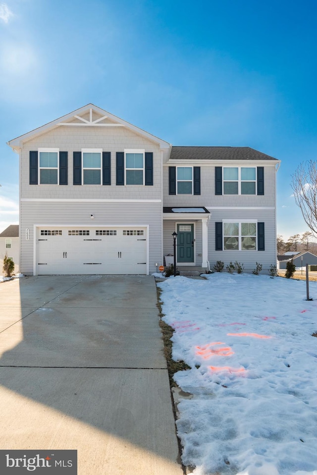 view of front of home with a garage