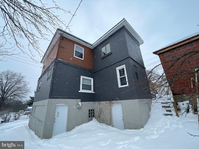 view of snow covered property