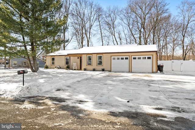 ranch-style home with a garage