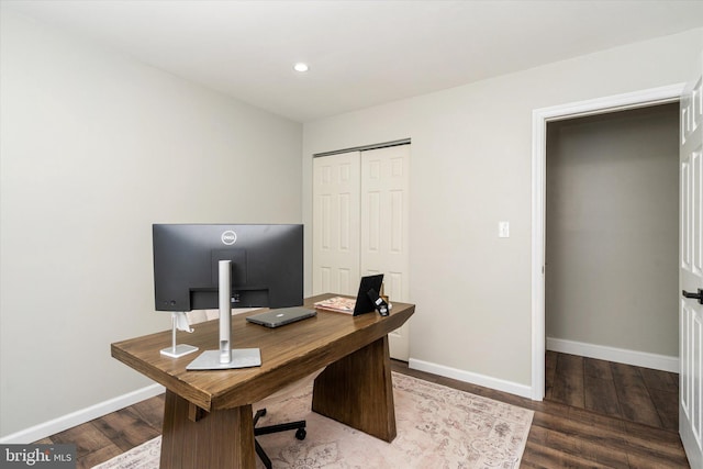 home office featuring dark hardwood / wood-style flooring