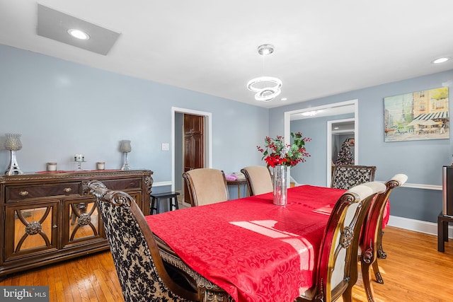 dining room with light hardwood / wood-style flooring