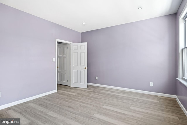 empty room featuring light hardwood / wood-style floors